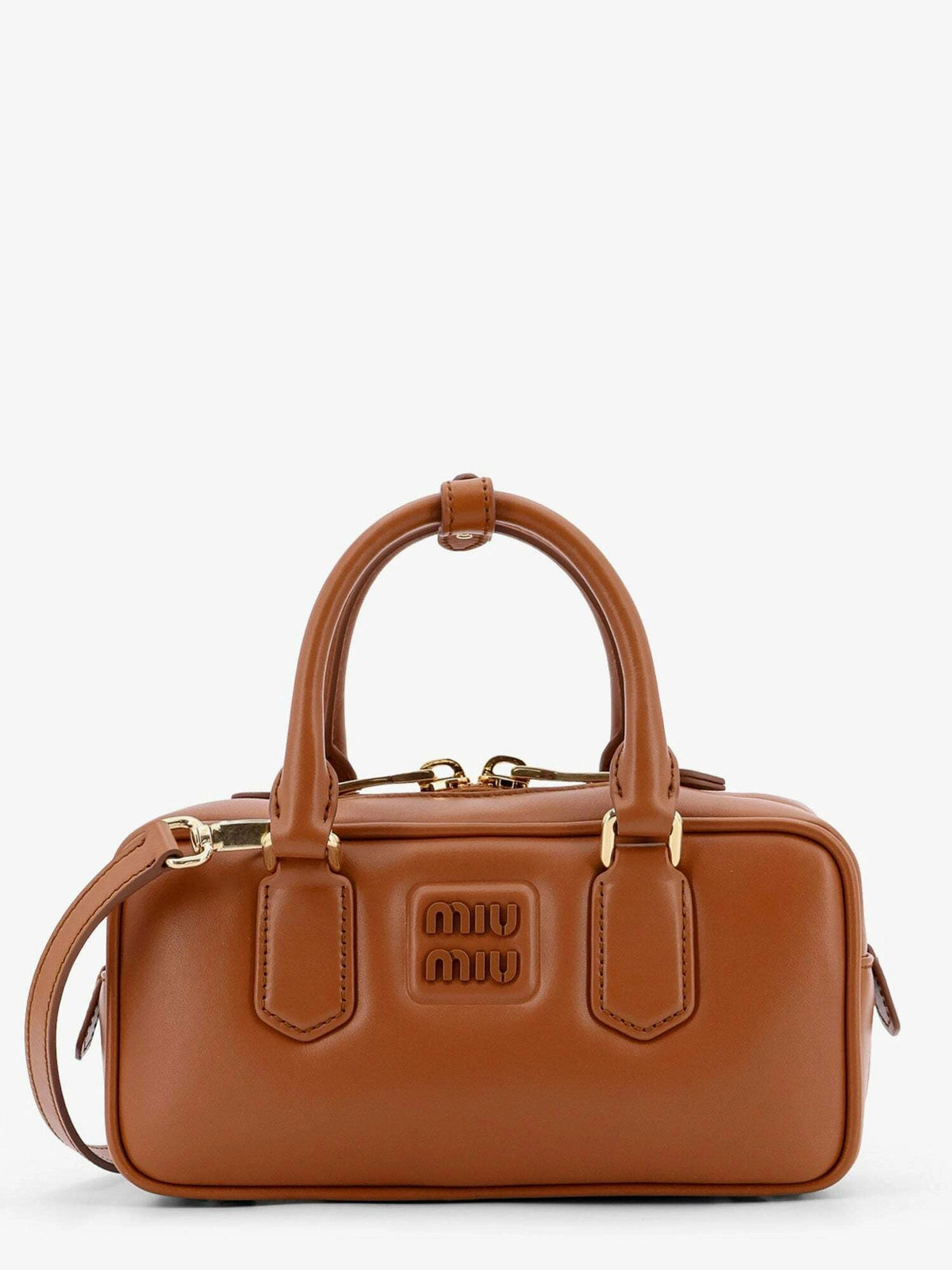 جلد بني من Miu Miu